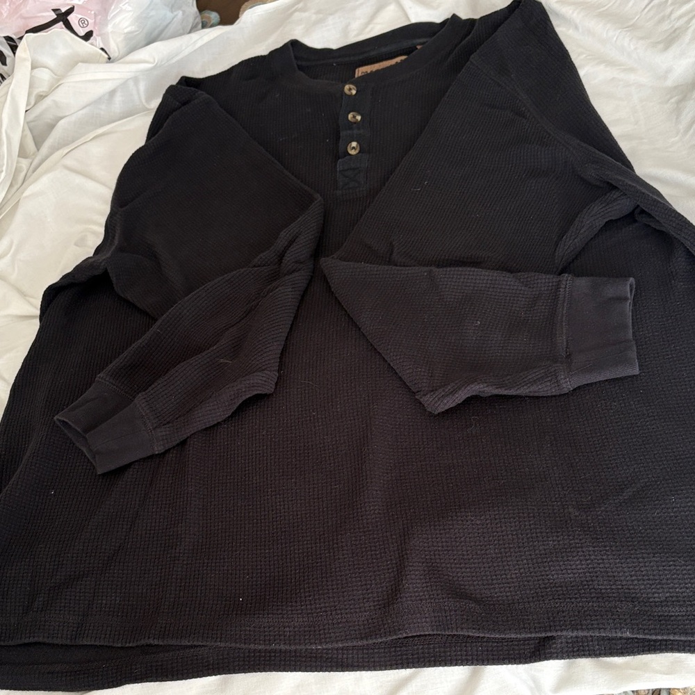 Magellan Outdoors Black Ribbed Henley with long sleeves.
